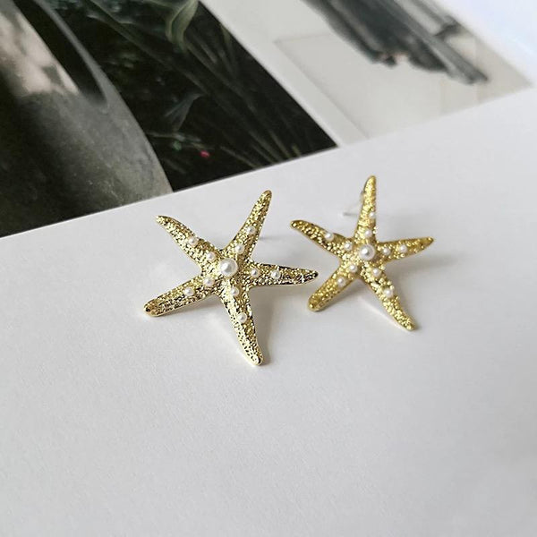 Starfish gold earrings